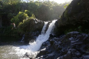 Waterfall jumping at the seven sacred pools, Haleakala NP, Maui
