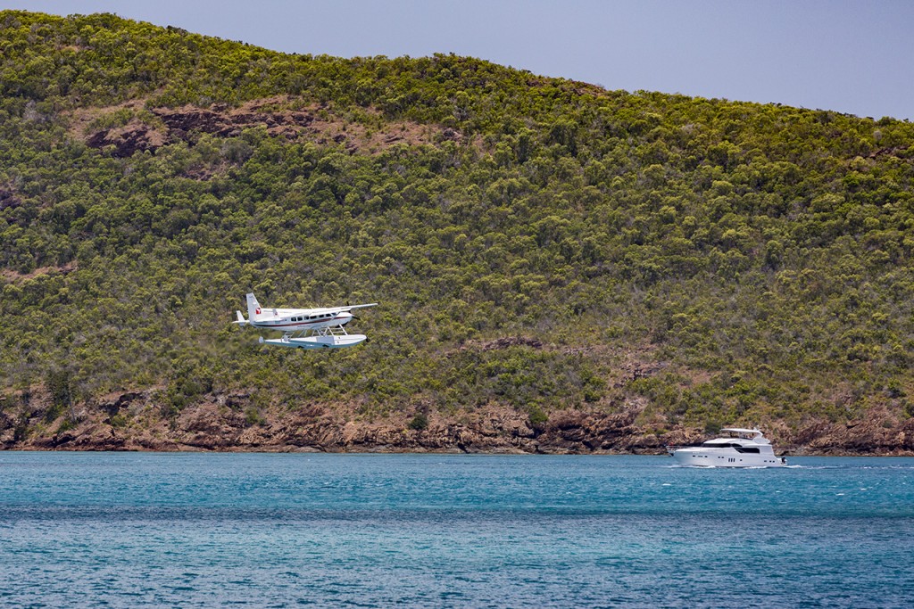 Heavy traffic on Whitehaven Beach, Whitsunday Islands, Queensland, Australia