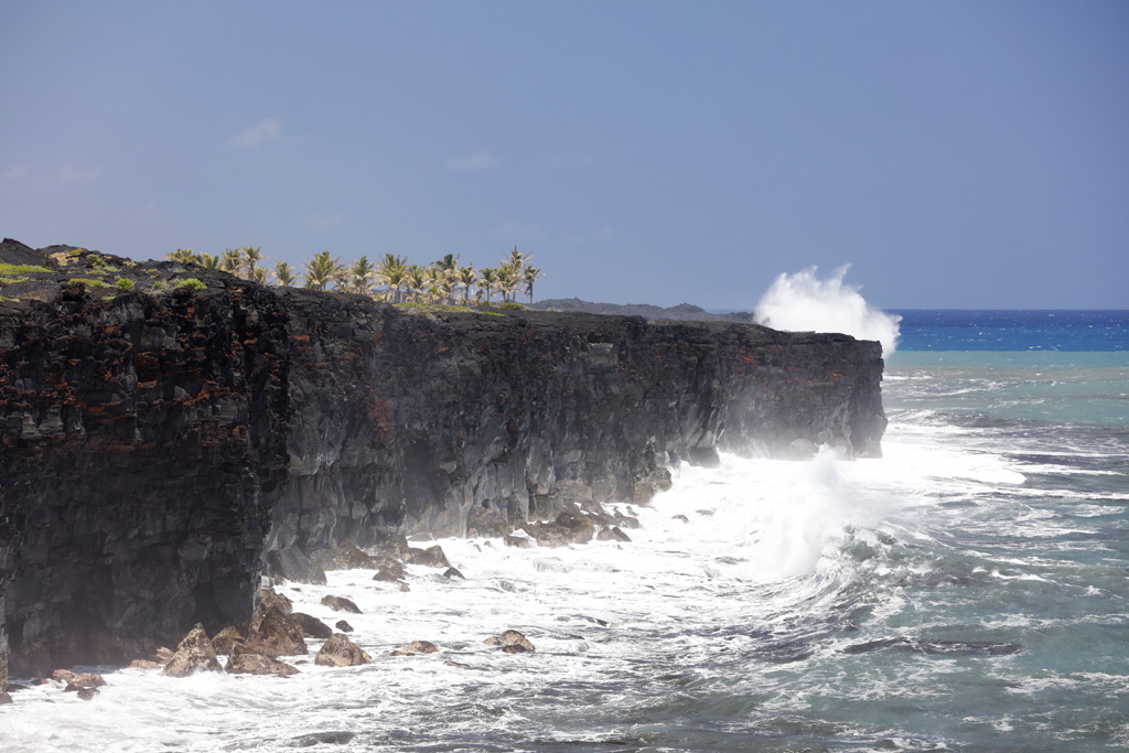 Coast off Hawai'i's Volcanoes National Park at high surf, Hawai'i, USA