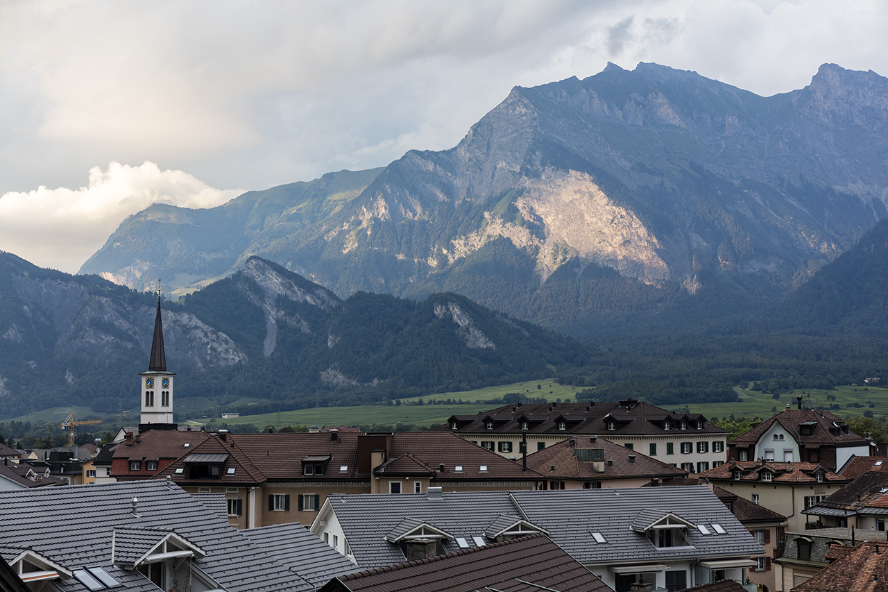 View across Bad Ragaz to Falknishorn with Mazorakopf and the wall at Falknistürme, St. Luzisteig in front with Schnielskopf, St. Gallen, Switzerland