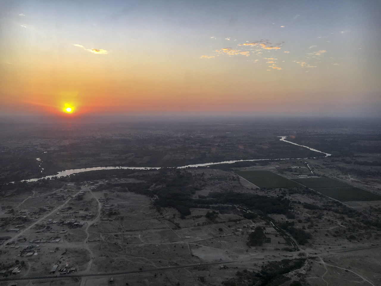 Piura River at Sunset from the Air, Piura, Peru