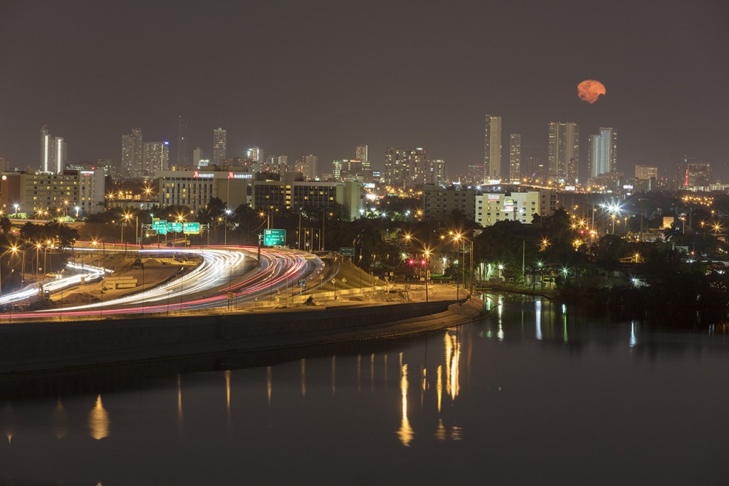 Skyline with red moon, Miami, Florida, USA