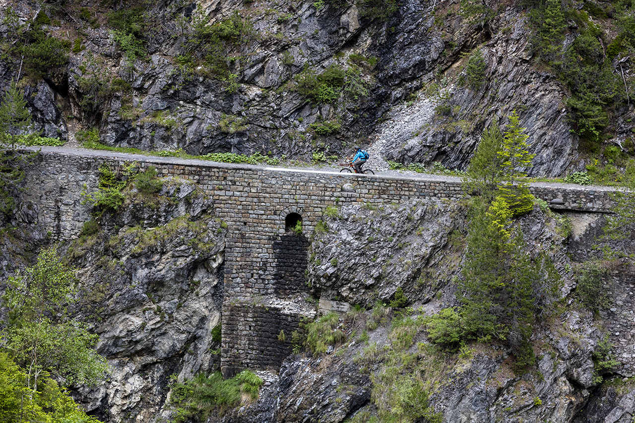 Passing Zügenschlucht Gorge on the Alps Epic Bike Trail near Filisur, Grisons, Switzerland