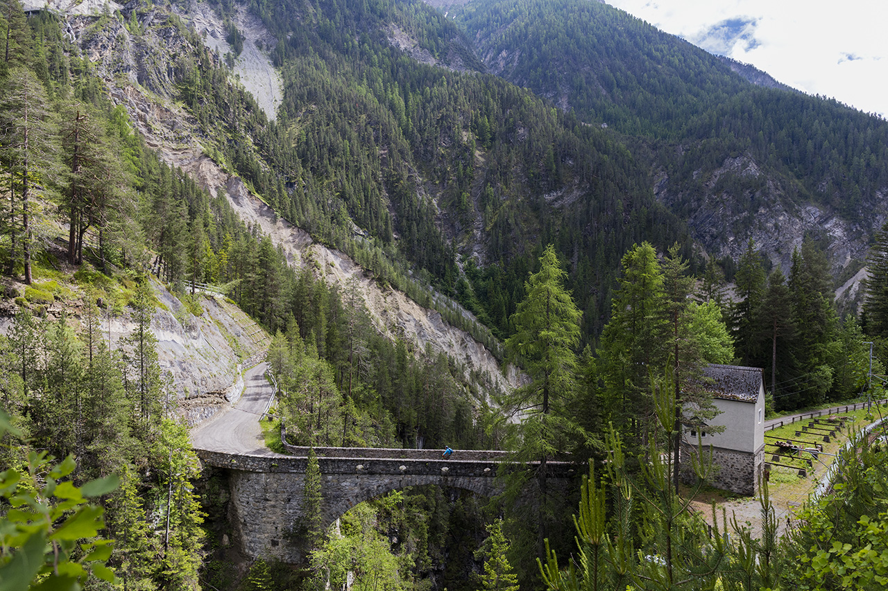 Passing a stone bridge near Davos Wiesen Station