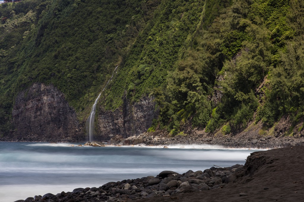 Rare waterfall into Waipi'o Valley on the Hamakua Coast, Big Island of Hawai'i, USA