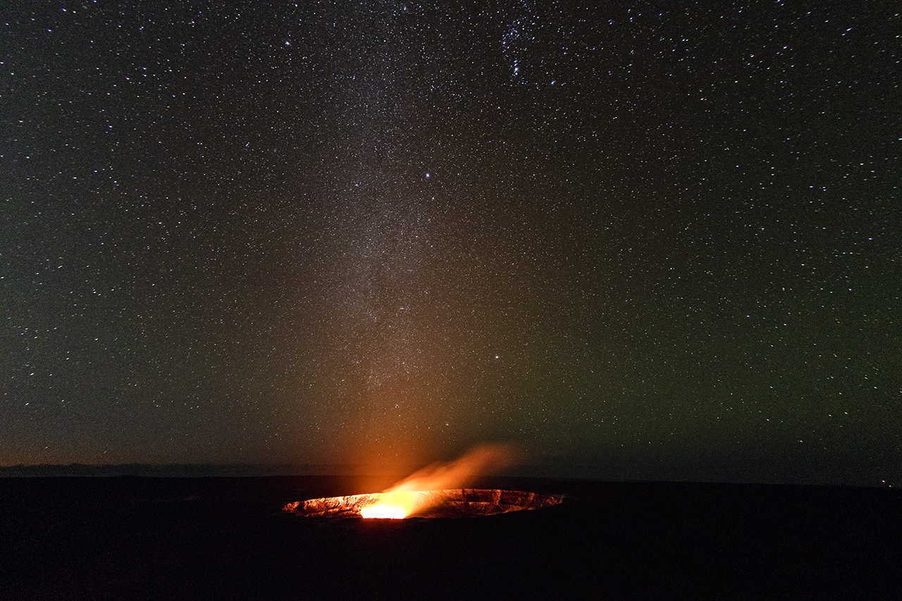 Milky Way and Orion nebula above Halema'uma'u eruption, Hawai'i Volcanoes National Park, Big Island of Hawai'i