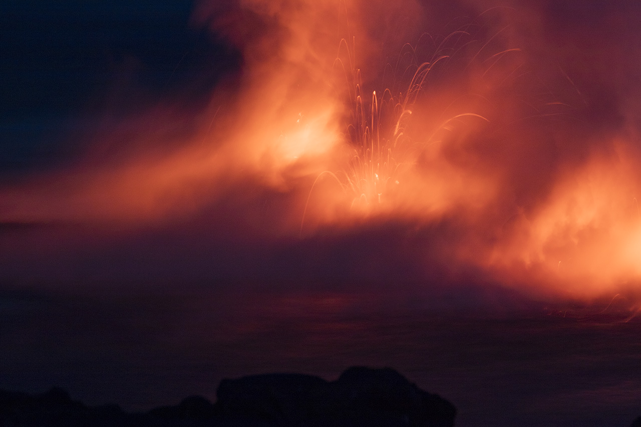 Spatter explodes at ocean entry, Kalapana, Kilauea volcano, Big Island of Hawai'i, USA